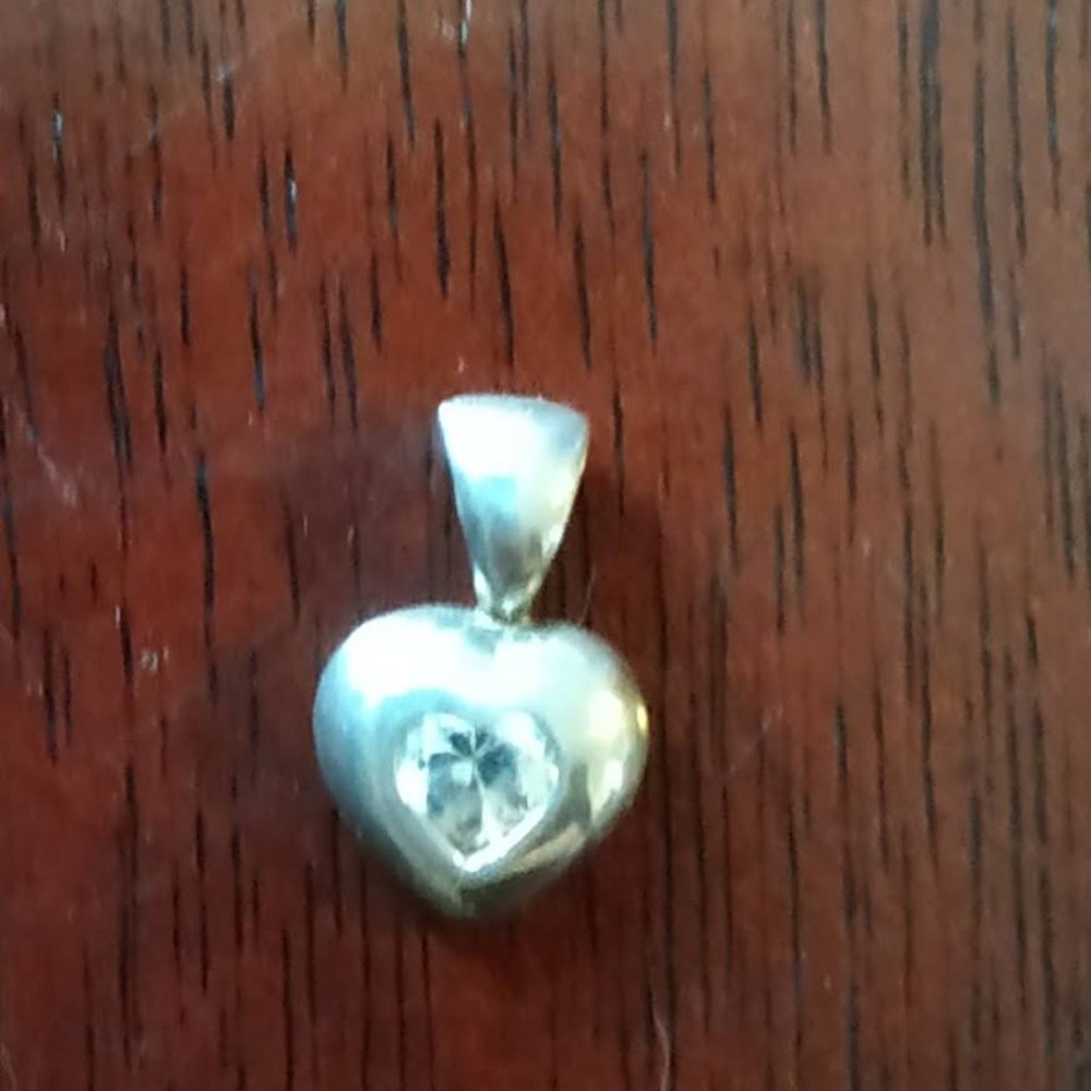 Heart shape silver pendant